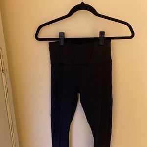 Athleta  ultimate stash pocket tight 7/8